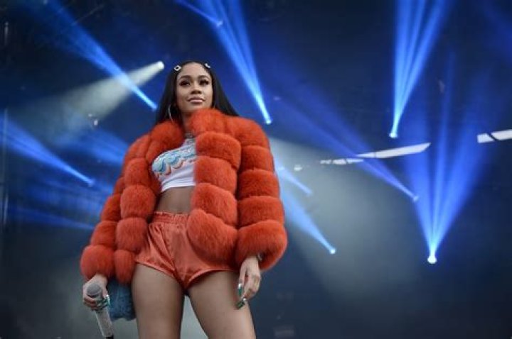 Saweetie Performs At iHeartRadio Music Festival In Her Airport Clothes